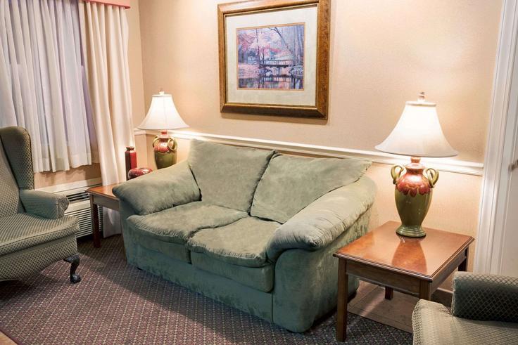 Elegantly designed living room with modern furnishings in an apartment at Building Harper Road - wyndham - 1652161 in Beckley, Beckley