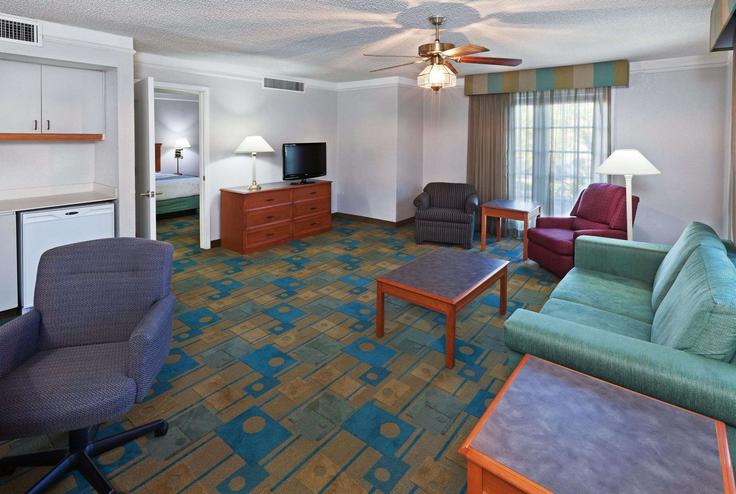 Elegantly designed living room with modern furnishings in an apartment at Building East Oltorf Street - wyndham - 1682487 in Austin, Austin Elegantly designed living room with modern furnishings in an apartment at Building East Oltorf Street - wyndham - 1682487 in Austin, Austin