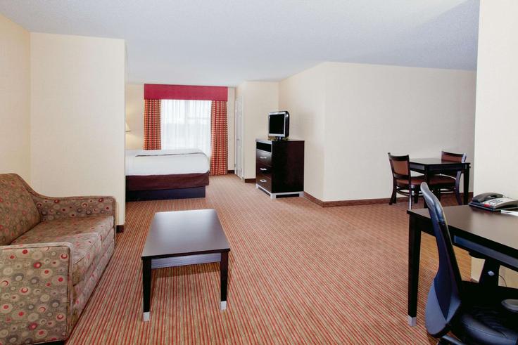 Warner Robins Warner RobinsのBuilding Watson Boulevard - wyndham - 1694177のアパートメントにある、モダンな家具を備えたエレガントなデザインのリビングルーム Warner Robins Warner RobinsのBuilding Watson Boulevard - wyndham - 1694177のアパートメントにある、モダンな家具を備えたエレガントなデザインのリビングルーム
