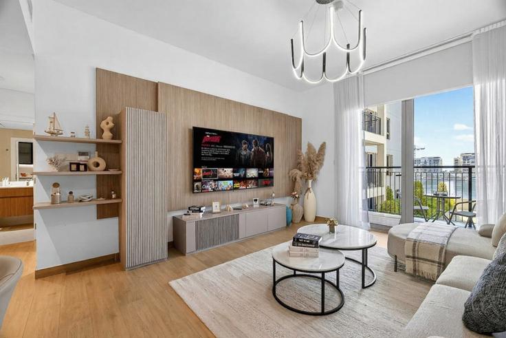 Dubai JumeirahのBuilding Tariaq Bedon Esm - wyz-rent-holiday-homes-llc - 1460226のアパートメントにある、モダンな家具を備えたエレガントなデザインのリビングルーム Dubai JumeirahのBuilding Tariaq Bedon Esm - wyz-rent-holiday-homes-llc - 1460226のアパートメントにある、モダンな家具を備えたエレガントなデザインのリビングルーム
