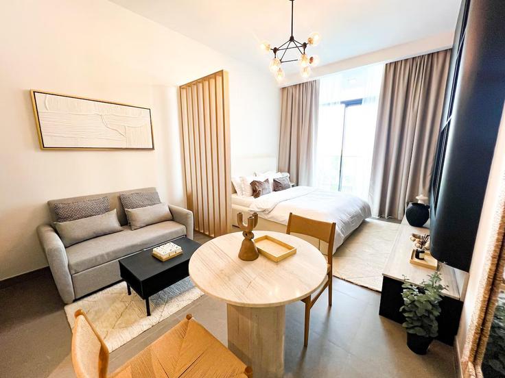 Elegantly designed living room with modern furnishings in an apartment at Building Tariaq Bedon Esm - xiq-vacation-homes - 1496933 in Al Barsha South Fourth, Dubai