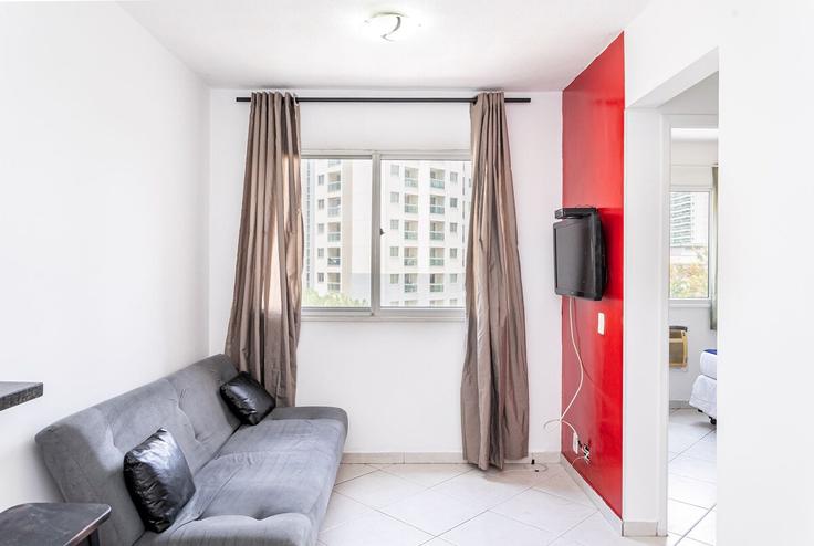 Salle de séjour élégante avec mobilier moderne dans un appartement à Building Estrada dos Bandeirantes - yes-temporada - 1253352 - RIO à Jacarepaguá, Rio de Janeiro Salle de séjour élégante avec mobilier moderne dans un appartement à Building Estrada dos Bandeirantes - yes-temporada - 1253352 - RIO à Jacarepaguá, Rio de Janeiro