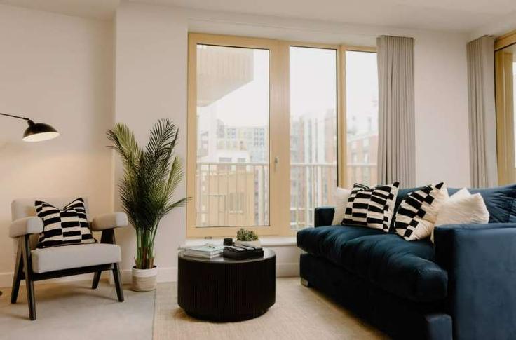 Elegantly designed living room with modern furnishings in an apartment at Building Malthouse Road - your-perfect-stay - 1475963 in London Borough of Wandsworth, London