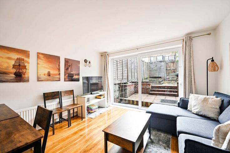Elegantly designed living room with modern furnishings in an apartment at Building Lemmon Road - yourairhost-guesty - 1466150 in Royal Borough of Greenwich, London Elegantly designed living room with modern furnishings in an apartment at Building Lemmon Road - yourairhost-guesty - 1466150 in Royal Borough of Greenwich, London