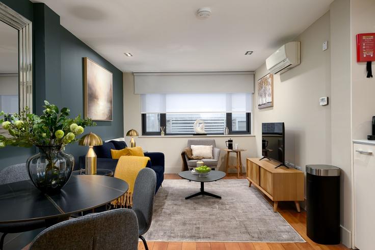 Elegantly designed living room with modern furnishings in an apartment at Building Lovat Lane - yourapartment - 1261186 - LON in City of London, London Elegantly designed living room with modern furnishings in an apartment at Building Lovat Lane - yourapartment - 1261186 - LON in City of London, London