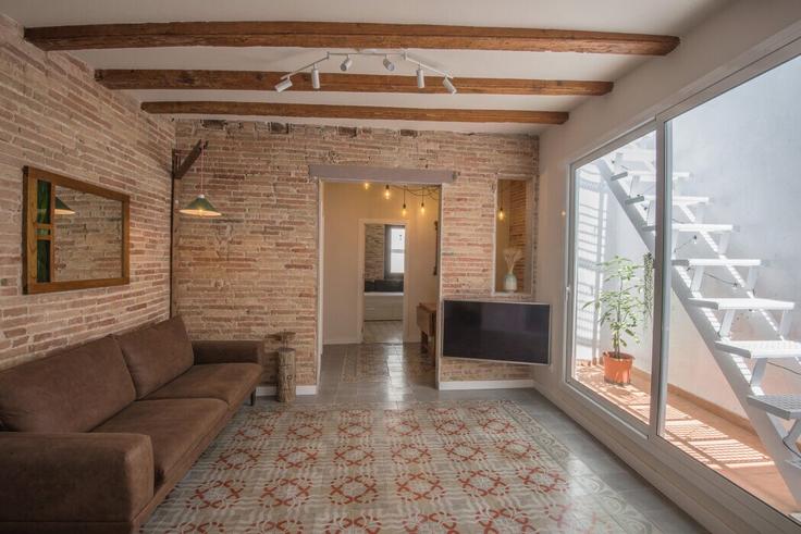 Salle de séjour élégante avec mobilier moderne dans un appartement à Building Carrer dels Tallers - youstylish-apartments - 1232831 à Ciutat Vella, Barcelona Salle de séjour élégante avec mobilier moderne dans un appartement à Building Carrer dels Tallers - youstylish-apartments - 1232831 à Ciutat Vella, Barcelona