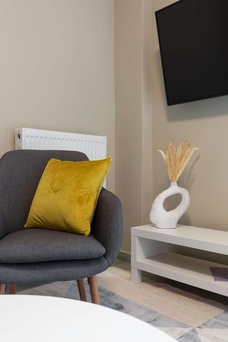 Athens Central AthensのBuilding Paggeou - zoialiving - 1038740 - ATHのアパートメントにある、モダンな家具を備えたエレガントなデザインのリビングルーム Athens Central AthensのBuilding Paggeou - zoialiving - 1038740 - ATHのアパートメントにある、モダンな家具を備えたエレガントなデザインのリビングルーム