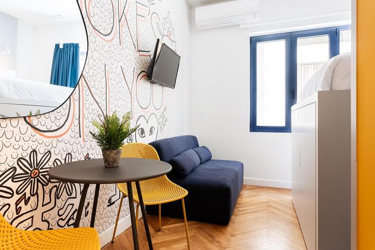 Elegantly designed living room with modern furnishings in an apartment at Building Georgiou Gennadiou - zoialiving - 1038707 - ATH in Central Athens, Athens