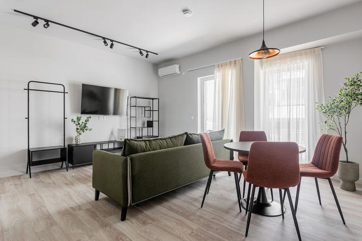 Elegantly designed living room with modern furnishings in an apartment at Building Agiou Nikolaou - zoialiving - 1299495 - ATH in Central Athens, Athens