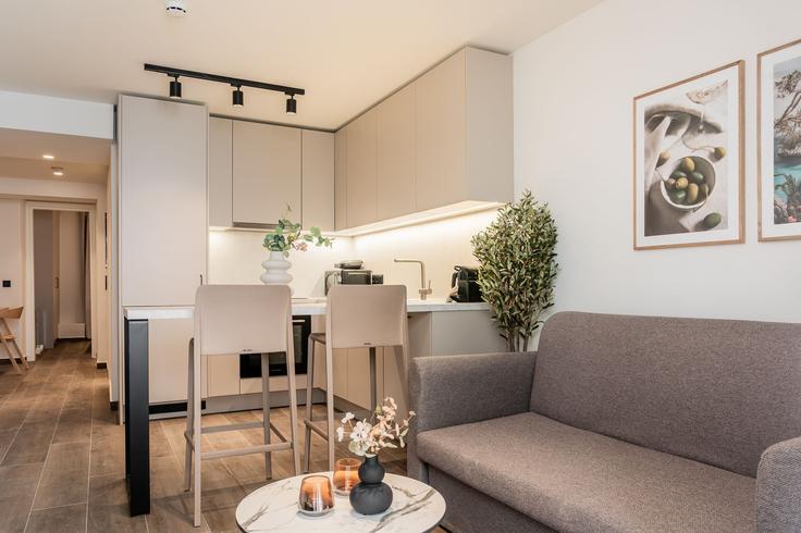 Elegantly designed living room with modern furnishings in an apartment at Building Kleomenous - zoialiving - 1299464 - ATH in Central Athens, Athens