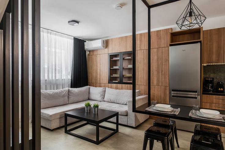 Elegant gestaltetes Wohnzimmer mit moderner Einrichtung in einer Wohnung im Building Dinokratous - zoialiving - 1038755 - ATH in Central Athens, Athens