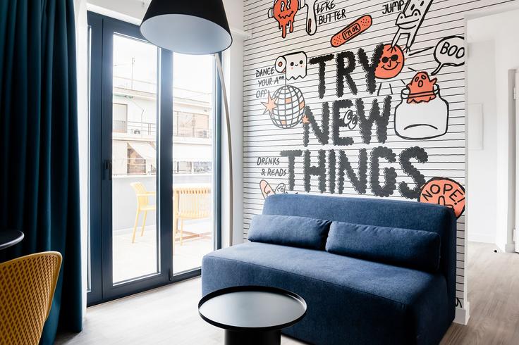 Elegantly designed living room with modern furnishings in an apartment at Building Georgiou Gennadiou - zoialiving - 1038713 - ATH in Central Athens, Athens