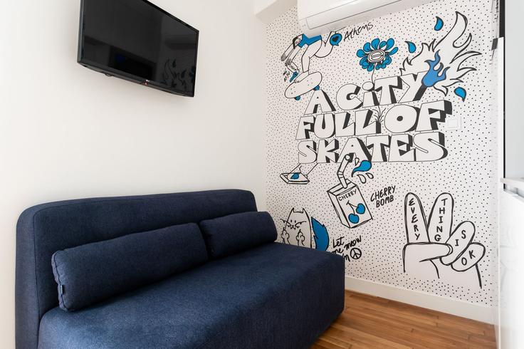 Elegantly designed living room with modern furnishings in an apartment at Building Georgiou Gennadiou - zoialiving - 1038692 - ATH in Central Athens, Athens