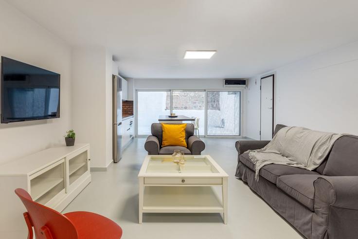 Elegantly designed living room with modern furnishings in an apartment at Building Agiou Nikolaou - zoialiving - 1038695 - ATH in Central Athens, Athens