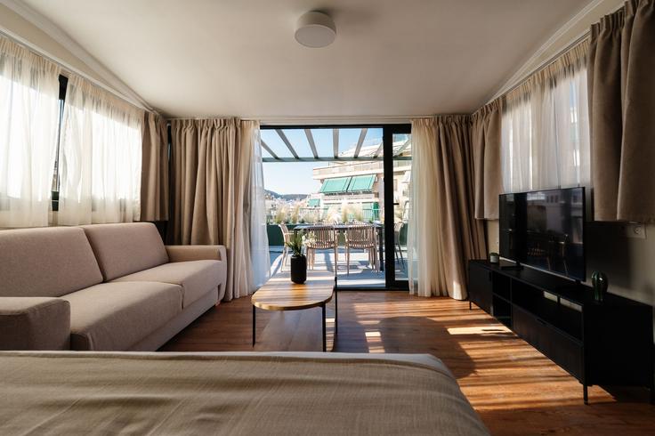 Salle de séjour élégante avec mobilier moderne dans un appartement à Building Empedokleous - zoialiving - 1299472 - ATH à Central Athens, Athens Salle de séjour élégante avec mobilier moderne dans un appartement à Building Empedokleous - zoialiving - 1299472 - ATH à Central Athens, Athens