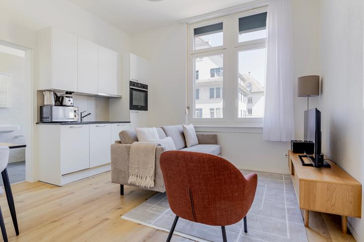 Salle de séjour élégante avec mobilier moderne dans un appartement à Schaffhauserstrasse 449, 8052, Zurich à District 11, Zurich