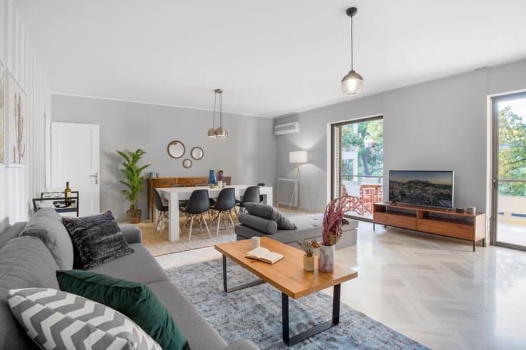 Elegantly designed living room with modern furnishings in an apartment at 1935de9f-bac3-416e-b669-428e024a3a10 in Kifisia, Athens