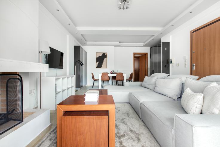 Chic living room with minimalist design from a furnished apartment in Glyfada, Athens