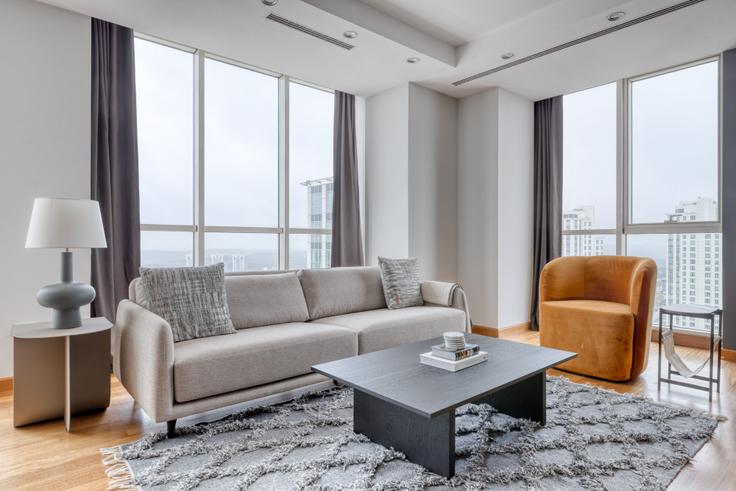 Elegantly designed living room with modern furnishings in an apartment at Mashattan Sitesi in Maslak, Istanbul