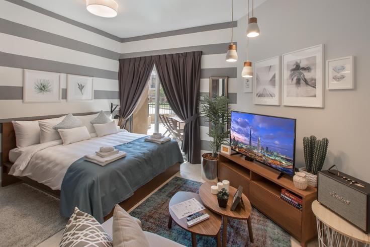 Salle de séjour élégante avec mobilier moderne dans un appartement à Diamond Views 2 (Tower A) à Jumeirah Village, Dubai Salle de séjour élégante avec mobilier moderne dans un appartement à Diamond Views 2 (Tower A) à Jumeirah Village, Dubai