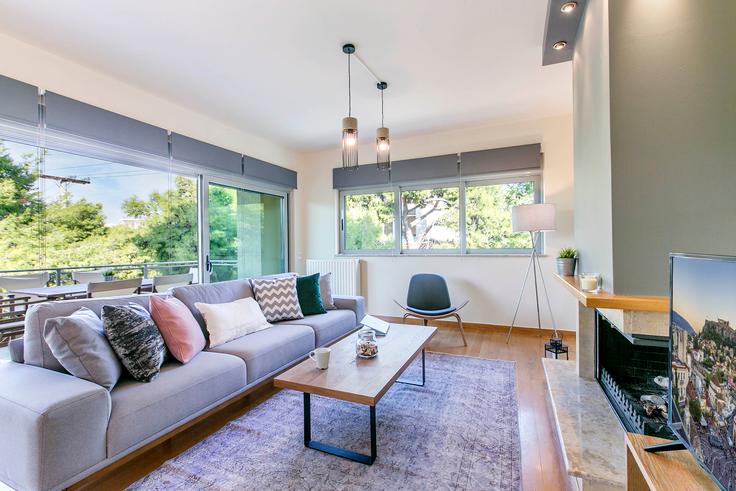 Chic living room with minimalist design from a furnished apartment in Chalandri, Athens