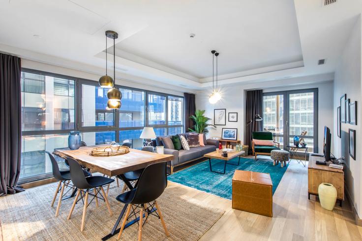 Elegantly designed living room with modern furnishings in an apartment at Ağaoğlu 1453 in Maslak, Istanbul