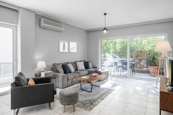 Elegantly designed living room with modern furnishings in an apartment at Marathonodromou VII in North Athens, Athens Elegantly designed living room with modern furnishings in an apartment at Marathonodromou VII in North Athens, Athens