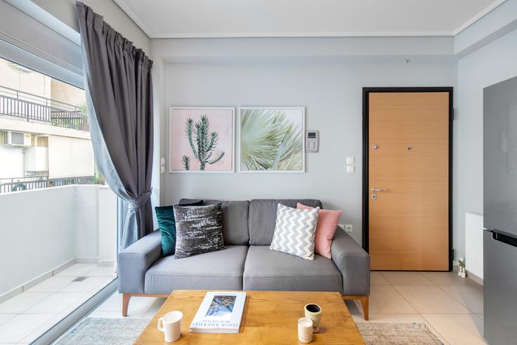 Chic living room with minimalist design from a furnished apartment in Chalandri, Athens