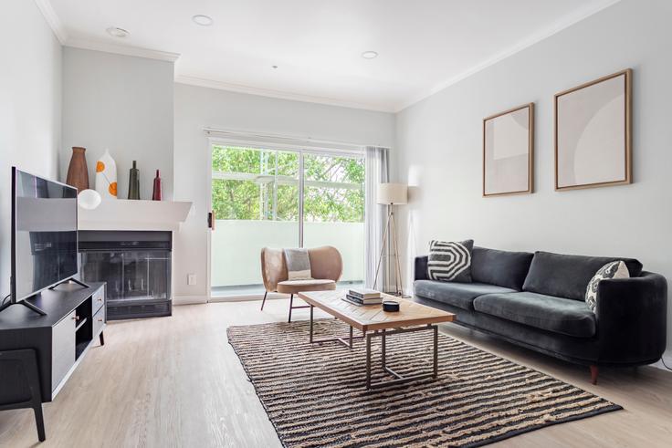 Elegantly designed living room with modern furnishings in an apartment at 16070 Sunset Blvd in Los Angeles, Los Angeles