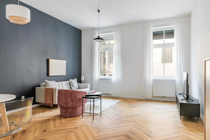 Sala de estar elegantemente projetada com móveis modernos em um apartamento no Kaiserstraße 67 / Stiege 2 em Wien, Wien