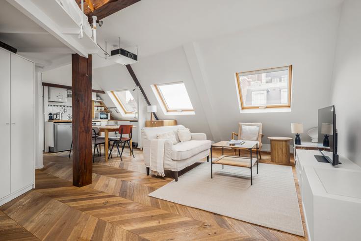 2nd arrondissement, Paris에 위치한 Caire 9 아파트의 세련된 인테리어가 돋보이는 거실 2nd arrondissement, Paris에 위치한 Caire 9 아파트의 세련된 인테리어가 돋보이는 거실
