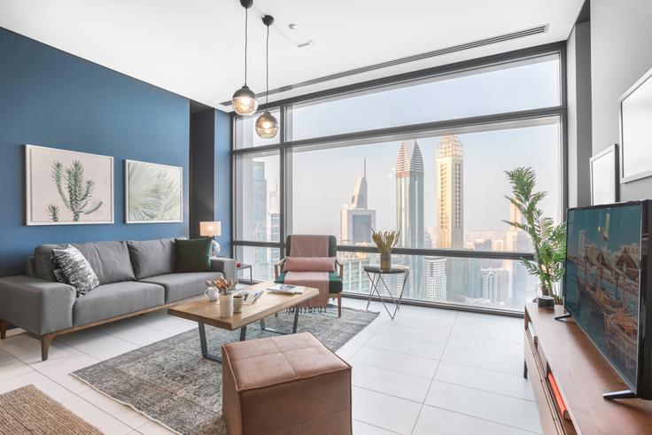 Index Tower adresindeki bir dairede modern mobilyalarla zarif bir şekilde tasarlanmış oturma odası Trade Center, Dubai Index Tower adresindeki bir dairede modern mobilyalarla zarif bir şekilde tasarlanmış oturma odası Trade Center, Dubai