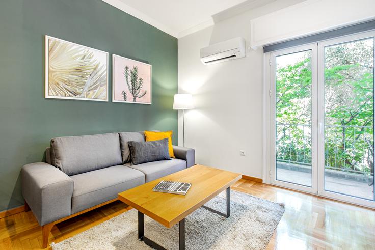 Chic living room with minimalist design from a furnished apartment in Kolonaki, Athens