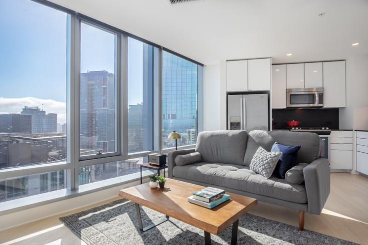 Elegantly designed living room with modern furnishings in an apartment at 340 Fremont in Rincon Hill, San Francisco Bay Area