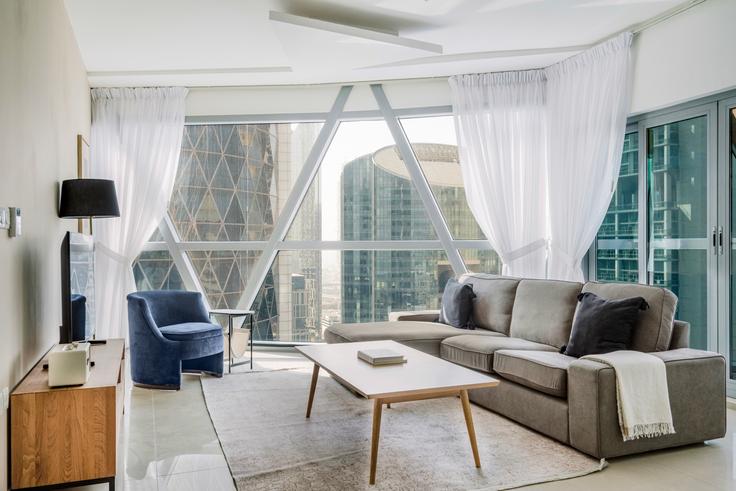 Salle de séjour élégante avec mobilier moderne dans un appartement à Park towers à Trade Center, Dubai