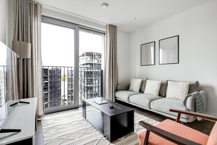 Salle de séjour élégante avec mobilier moderne dans un appartement à Bloom Nine Elms à London Borough of Wandsworth, London Salle de séjour élégante avec mobilier moderne dans un appartement à Bloom Nine Elms à London Borough of Wandsworth, London
