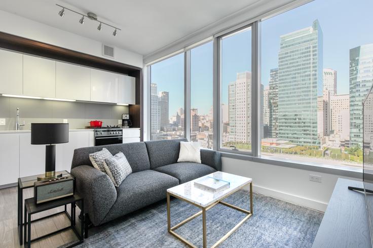 Elegante sala de estar con mobiliario moderno en un apartamento en Spera en San Francisco, San Francisco Elegante sala de estar con mobiliario moderno en un apartamento en Spera en San Francisco, San Francisco