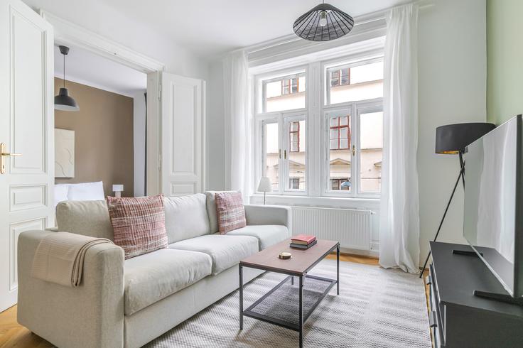 Salle de séjour élégante avec mobilier moderne dans un appartement à Gardegasse 9 à Vienna, Vienna Salle de séjour élégante avec mobilier moderne dans un appartement à Gardegasse 9 à Vienna, Vienna