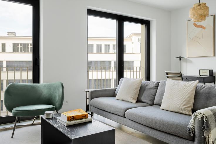 Elegantly designed living room with modern furnishings in an apartment at 19 Rue de Hollerich, 1741 Gare Luxembourg in Luxembourg, Luxembourg