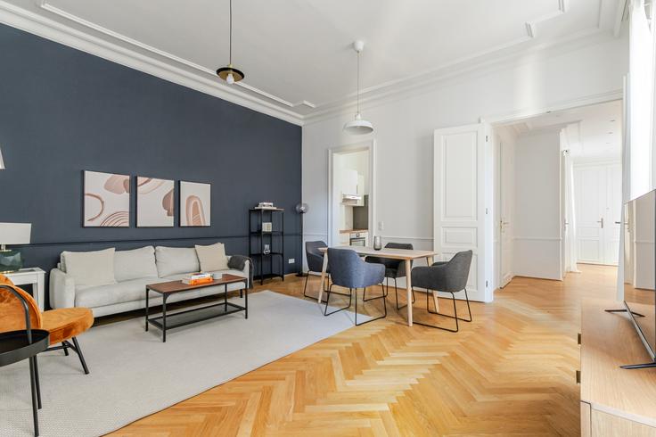 Vienna ViennaのAlser Straße 55 / Stiege 1のアパートメントにある、モダンな家具を備えたエレガントなデザインのリビングルーム Vienna ViennaのAlser Straße 55 / Stiege 1のアパートメントにある、モダンな家具を備えたエレガントなデザインのリビングルーム