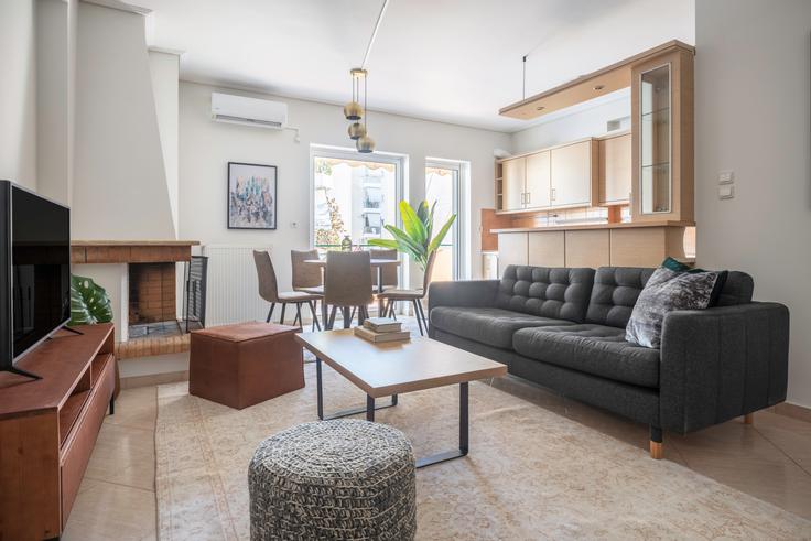 Chic living room with minimalist design from a furnished apartment in Marousi, Athens