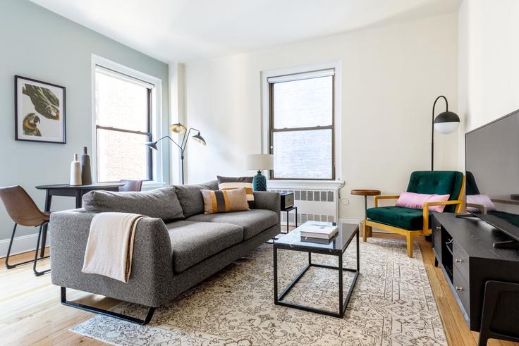 Elegantly designed living room with modern furnishings in an apartment at 952 Fifth Avenue in Upper East Side, New York