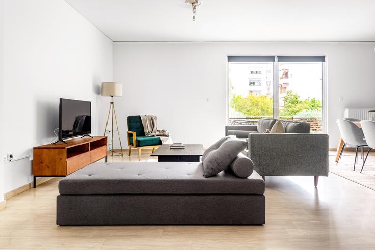 South Athens, Athens에 위치한 Xanthou III 아파트의 세련된 인테리어가 돋보이는 거실 South Athens, Athens에 위치한 Xanthou III 아파트의 세련된 인테리어가 돋보이는 거실