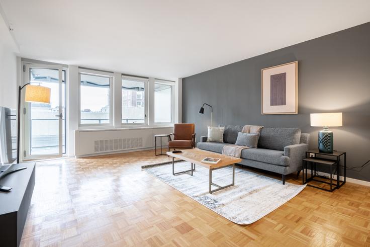 Salle de séjour élégante avec mobilier moderne dans un appartement à Avalon prudential à Boston, Boston Salle de séjour élégante avec mobilier moderne dans un appartement à Avalon prudential à Boston, Boston