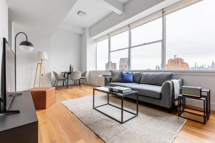 Elegantly designed living room with modern furnishings in an apartment at 50 Murray Street in Tribeca, New York