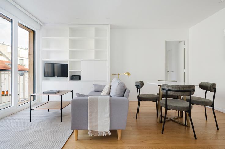 Elegante sala de estar con mobiliario moderno en un apartamento en Villa de Saxe 4 en 7th arrondissement, Paris Elegante sala de estar con mobiliario moderno en un apartamento en Villa de Saxe 4 en 7th arrondissement, Paris