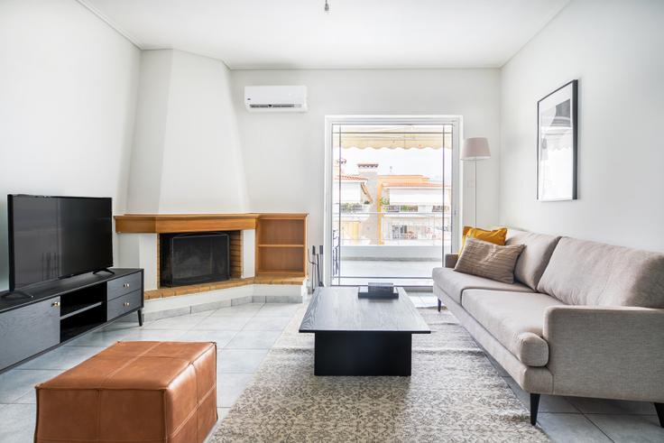 Elegantly designed living room with modern furnishings in an apartment at Olimpias IV in North Athens, Athens