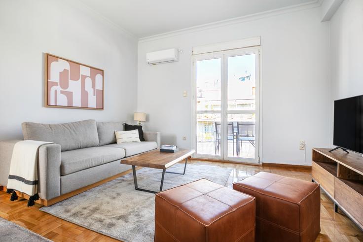 Chic living room with minimalist design from a furnished apartment in Kolonaki, Athens