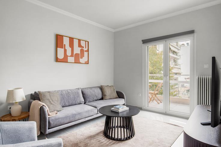 Athens South AthensのSirinon 32のアパートメントにある、モダンな家具を備えたエレガントなデザインのリビングルーム Athens South AthensのSirinon 32のアパートメントにある、モダンな家具を備えたエレガントなデザインのリビングルーム