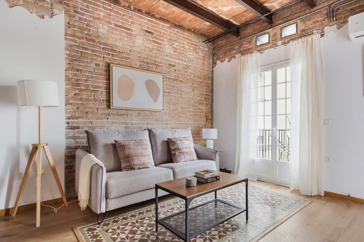 Salle de séjour élégante avec mobilier moderne dans un appartement à Jonqueres 14 à Ciutat Vella, Barcelona
